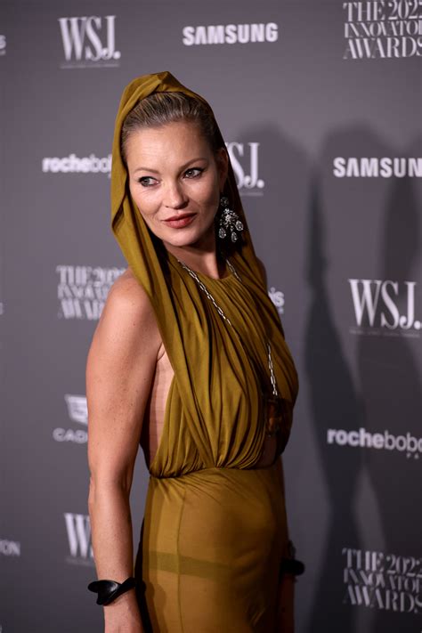 kate moss naked|Kate Moss, 48, strips completely naked to launch her new self。